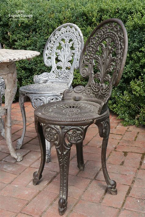 Ornate Cast Iron Garden Table And Four Chairs