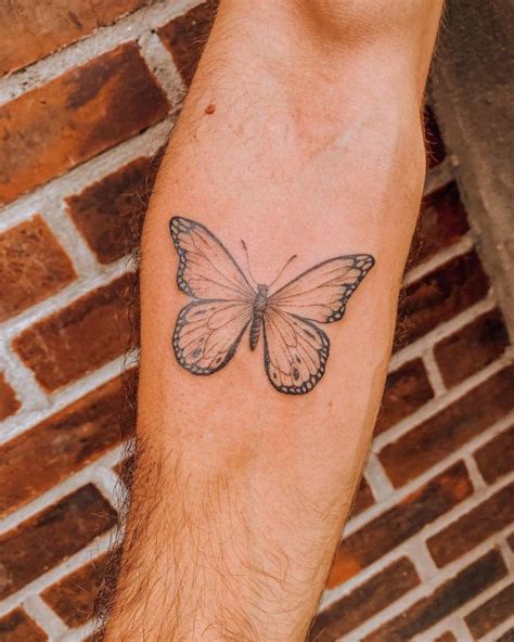 Fine Line Butterfly Tattoo On The Inner Forearm
