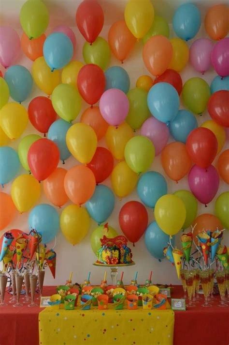This simple party decoration uses fork as placeholder. What are some simple birthday balloons decoration ideas at ...