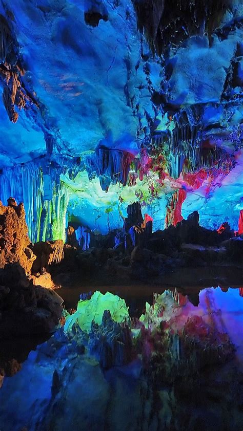 Colofrul Neon Lights In Reed Flute Cave China 4k Ultrahd Wallpaper Backiee