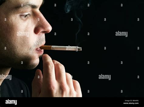 Man Smoking A Cigarette Stock Photo Alamy