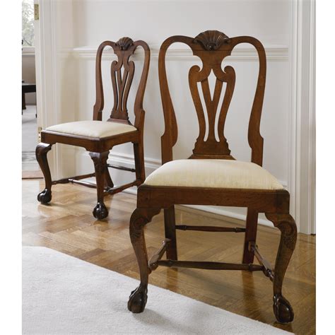 34 An Important Pair Of Queen Anne Carved And Figured Mahogany Side