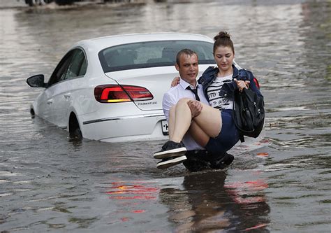 Hero In Suit Rescues Women From Flash Flood In World Cup Host City