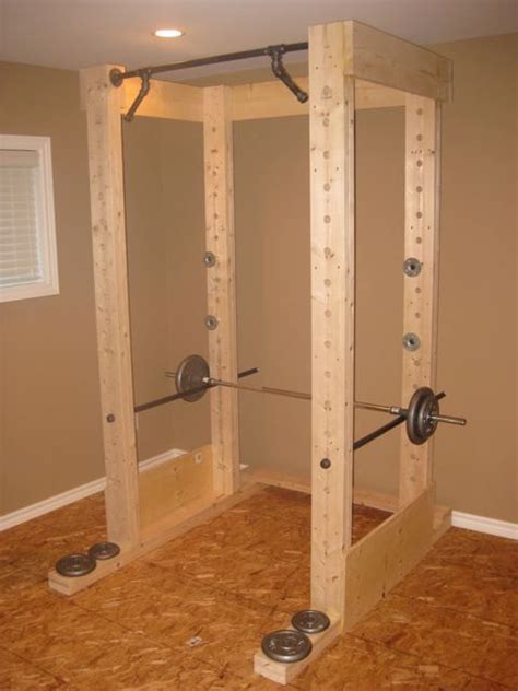 Homemade Power Rack Made Out Of Wood And Pipe Home Made Gym Diy