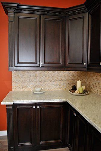 Whether you're interested in staining your kitchen cabinets, bathroom vanity or media cabinets in your home, the great news is that it's pretty easy to do and with the right products and stain, i have been so blown i read somewhere that you can apply get stain on top of cabinets that are painted. Dark Stained Kitchen Cabinets - Home Furniture Design