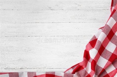 Checkered Picnic Blanket On Wooden Background Top View Stock Photo