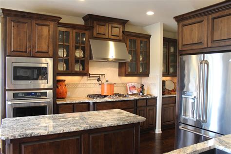 Is alder a good wood for cabinets doors? Burrows Cabinets kitchen in stained knotty alder and ...