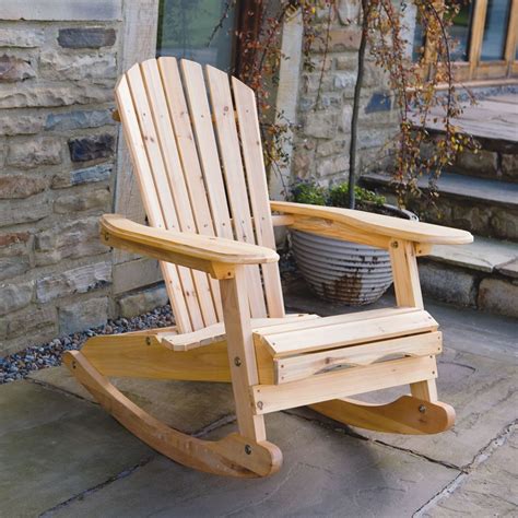Those with outdoor schemes with a contemporary flair will love the modern adirondack rocker, featuring three back slats (instead of the traditional five) that end in a clean, horizontal line rather than a gently sloping curve. 'Bowland' Garden Patio Wooden Adirondack Rocking Chair ...