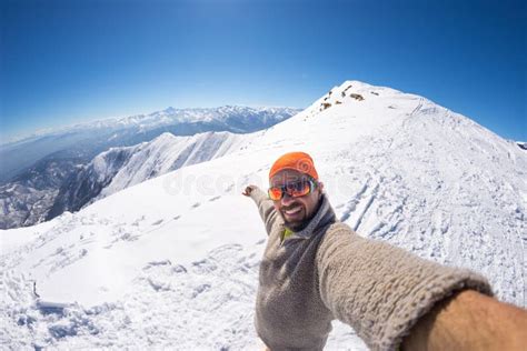 Alpinist Taking Selfie On Snowcapped Mountain Fisheye Lens Stock Image