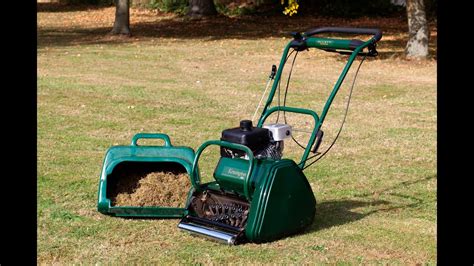 How to dethatch a lawn. How to Scarify your Lawn and Reduce Thatch using an Allett Mower - YouTube