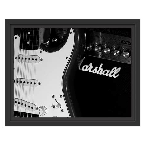 Black And White Photograph Of An Electric Guitar With The Word Marshall