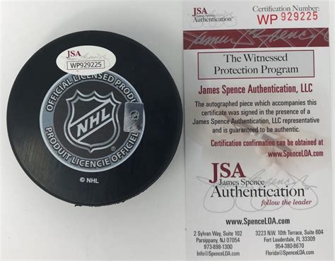 brock boeser autographed vancouver canucks “jersey stitch” puck house of hockey
