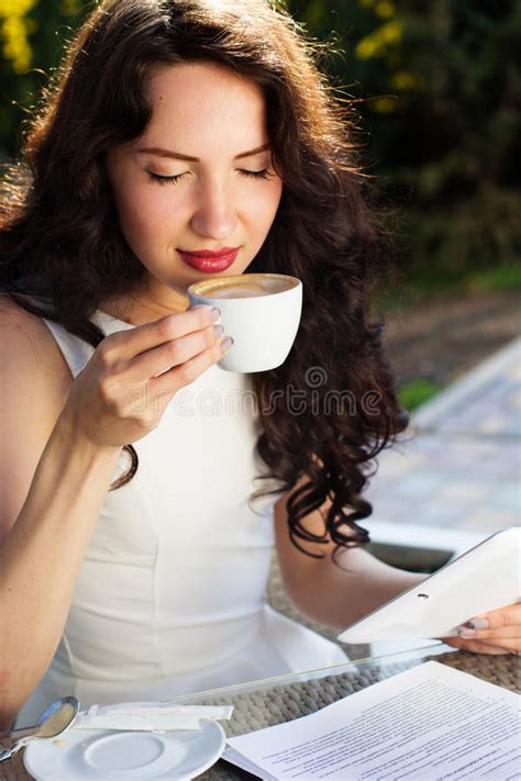 Girl Spending Time in a Cafe Using Digital Tablet Stock Image - Image ...