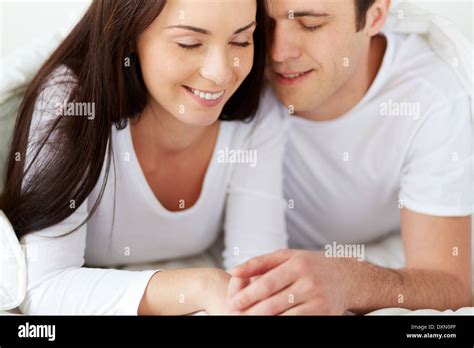 Portrait Of Amorous Young Couple In Bed Stock Photo Alamy