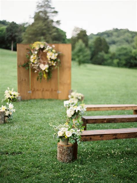 This hinged plywood altar piece and rustic benches are owned by cedarwood weddings, a venue and event styling company in nashville, tennessee. 30 DIY Wedding Arbors, Altars & Aisles | DIY