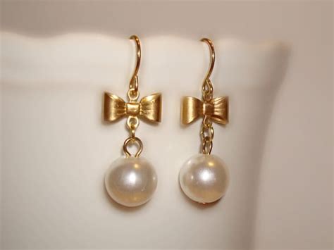 Items Similar To Pearl Bow Earrings On Etsy