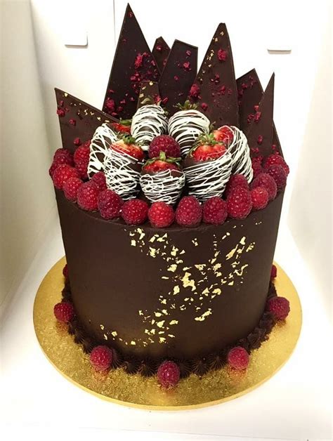 dark chocolate with freeze dried and fresh raspberries and chocolate dipped strawberries
