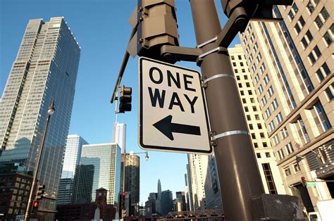 One Way Street Sign In The Downtown Photograph By Thepixelchef