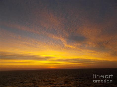 sunrise over the ocean photograph by angelika heidemann fine art america