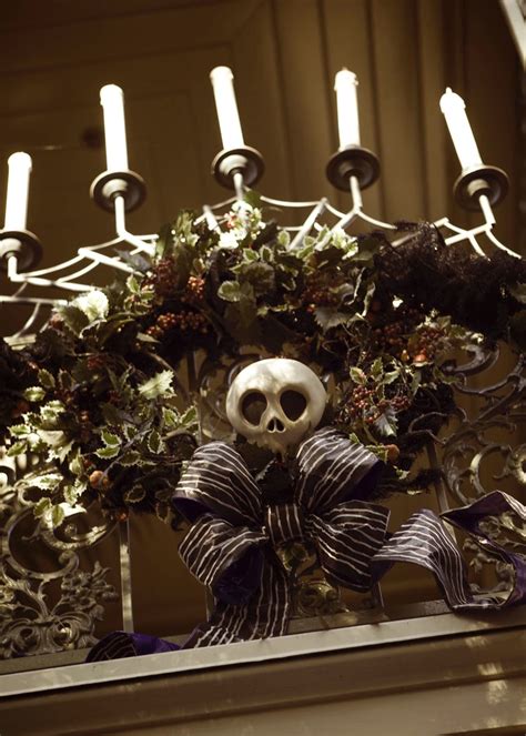 A Skeleton Is Sitting In Front Of A Chandelier Decorated With Flowers