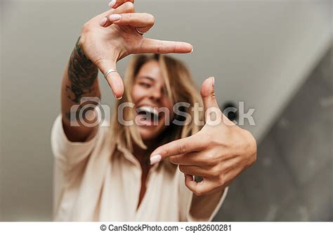 Image Of Woman Laughing And Making Photo Frame Sign With Fingers Image Of Cheerful Nice Blonde
