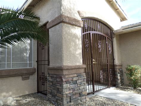 Wrought iron gate designs wrought iron gates burglar bars gate decoration new home wishes security gates front courtyard bathroom countertops front entrances. Wrought iron entry gate with porch enclosure panels ...