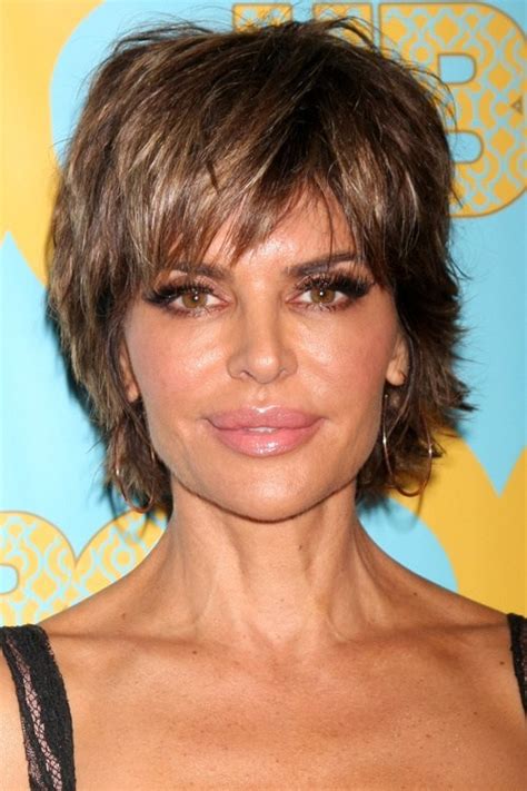 The pixie cut is not just a fashion statement; Pixie Haircuts with Bangs - 50 Terrific Tapers