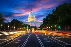 Capital building in Washington DC city at night wiht street and ...