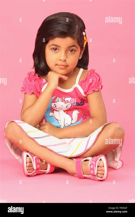 Portrait Of A Girl Sitting On The Floor Stock Photo Alamy