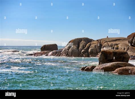 Big Boulders Rocks And Stones At The Beach Sea And Ocean Against A