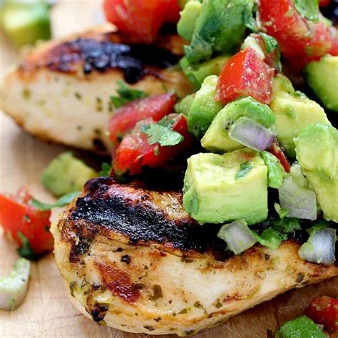 The chicken and avocado make a delicious pair and complement each other perfectly. Cilantro Lime Chicken with Avocado Salsa - Yummy Healthy Easy