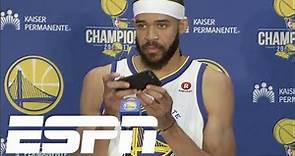 JaVale McGee takes pictures during news conference | ESPN