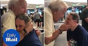 Beautiful moment dad has emotional reunion with down's syndrome son