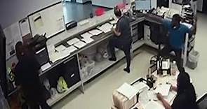 Video shows man attacking Orlando office employees with machete