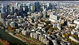 Aerial Footage / The city of Courbevoie including the business district of Paris la Défense