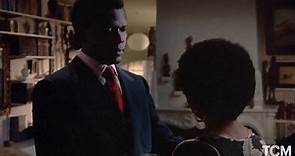 Sidney Poitier and Esther Anderson in A WARM DECEMBER