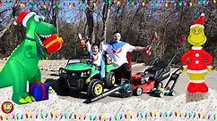 Fixing holiday lights with our lawn mower, chainsaw, leaf blower and weed eater | Mowers for kids