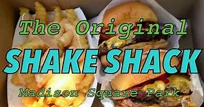 Eating burgers at the original Shake Shack - Madison Square Park, New York City
