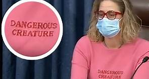 Kyrsten Sinema presides over Senate in hot pink 'Dangerous Creature' shirt