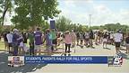 Students, parents rally for fall sports at Blue Valley School District headquarters