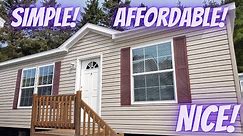 Tour of an affordable double wide by RedMan Homes. Simple, Affordable yet nice! 1173 sqft.
