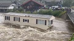 Storm Hans: Floodwaters in Norway send mobile home crashing into bridge