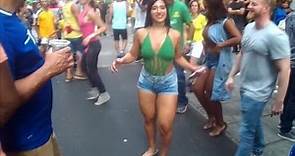 BRAZILIAN GIRLS CELEBRATE DANCING SAMBA MUSIC AT BRAZILIAN STREET DANCE PARTY IN NEW YORK CITY