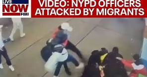 NYPD officers attacked by 5 migrant men in Times Square | LiveNOW from FOX
