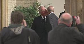 Prince Charles comforts the Queen with a kiss at funeral of Countess Mountbatten of Burma