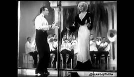 George Raft Dances to Alice Faye singing "I Feel a Song Coming On"