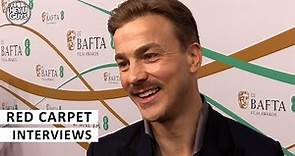 Albrecht Schuch BAFTAs 2023 Red Carpet Interview All Quiet on the Western Front