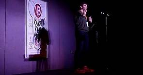 Syracuse University football player Cameron MacPherson performs at Schine Underground poetry slam