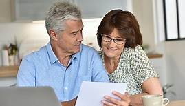 One in four savers dipping into pensions are also still paying in