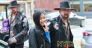 Nicolas Cage and wife Riko Shibata do some shopping in Soho New York after Thanksgiving